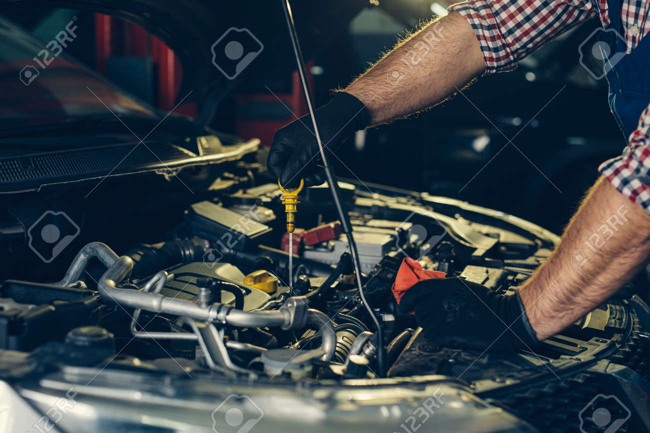 Car engine being repaired by a professional mechanic